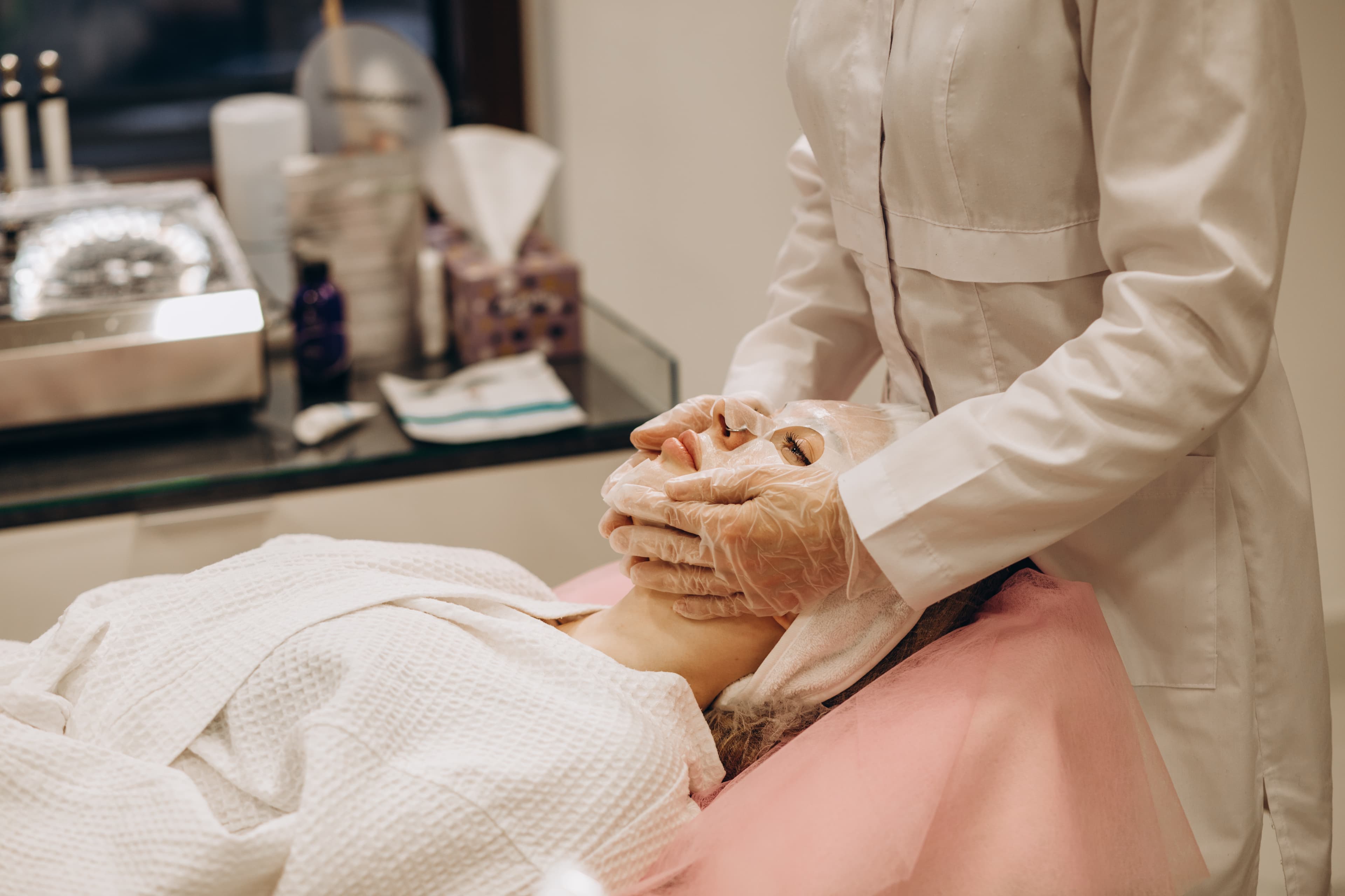 A practitioner working with a client in a bright, quiet room